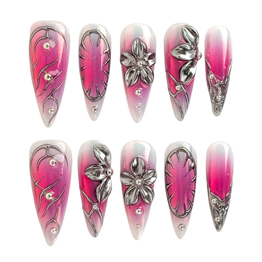 Press on nails roses jelly avec détails chrome argentés et fleurs 3D style Y2K par NailMusee