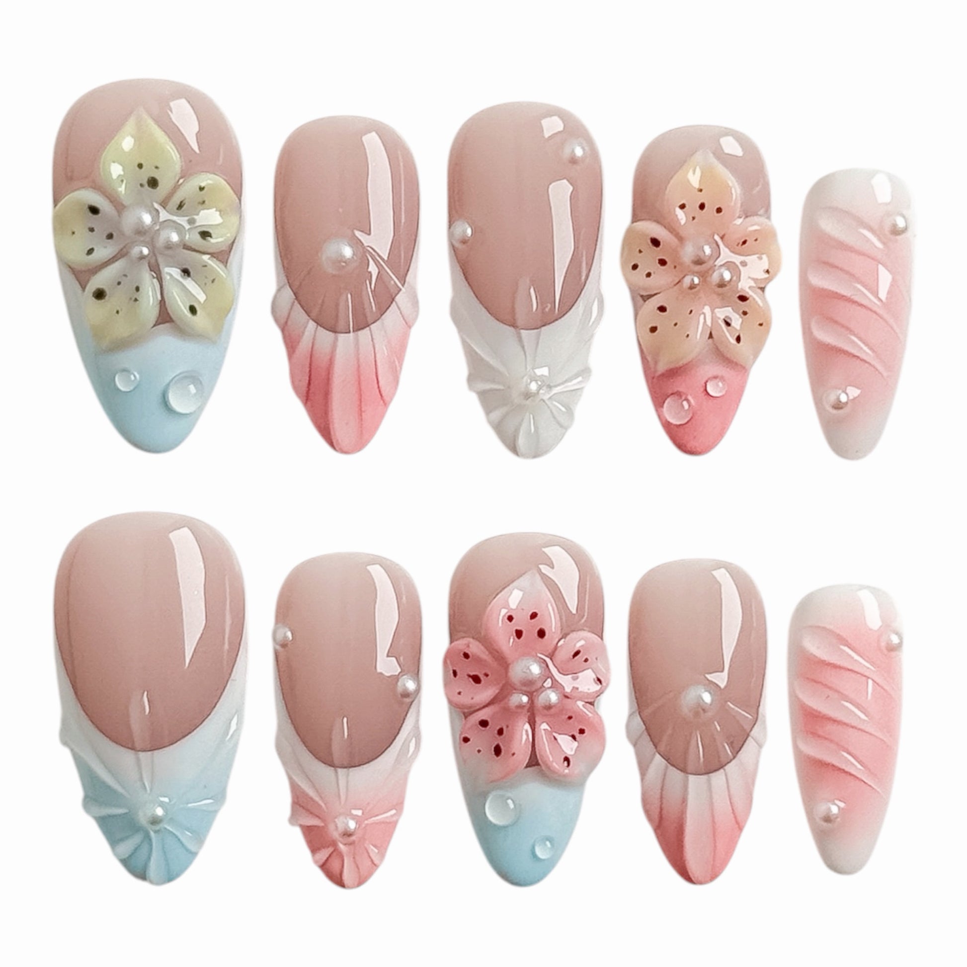 Côte Fleurie faux ongles floraux rose et bleu avec fleurs en relief, perles délicates et finition brillante par NailMusee