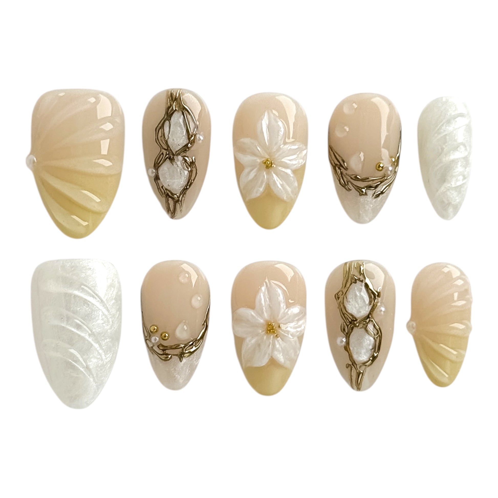 Ivory Relique handmade press-on nails by NailMusee featuring 3D floral details, pearl shell textures, and vintage gold accents in soft ivory nude tones.