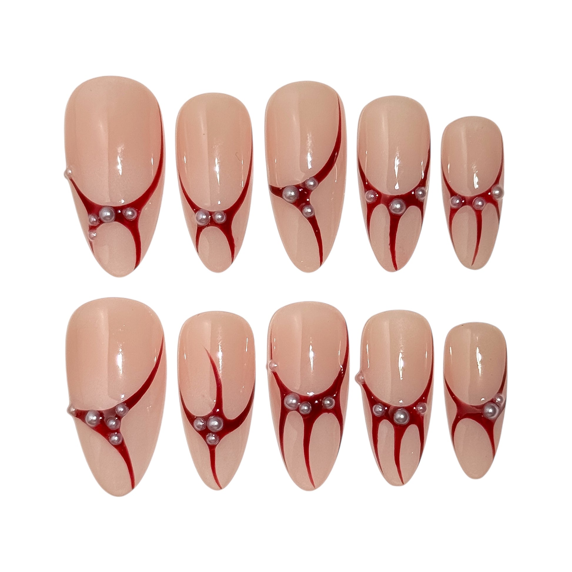Ongles press-on nude avec lignes carmin et perles, modèle Perle de Grenat.