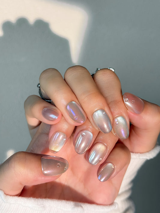 Ongles pressés élégants inspirés des perles du Pacifique, chaque pièce est unique