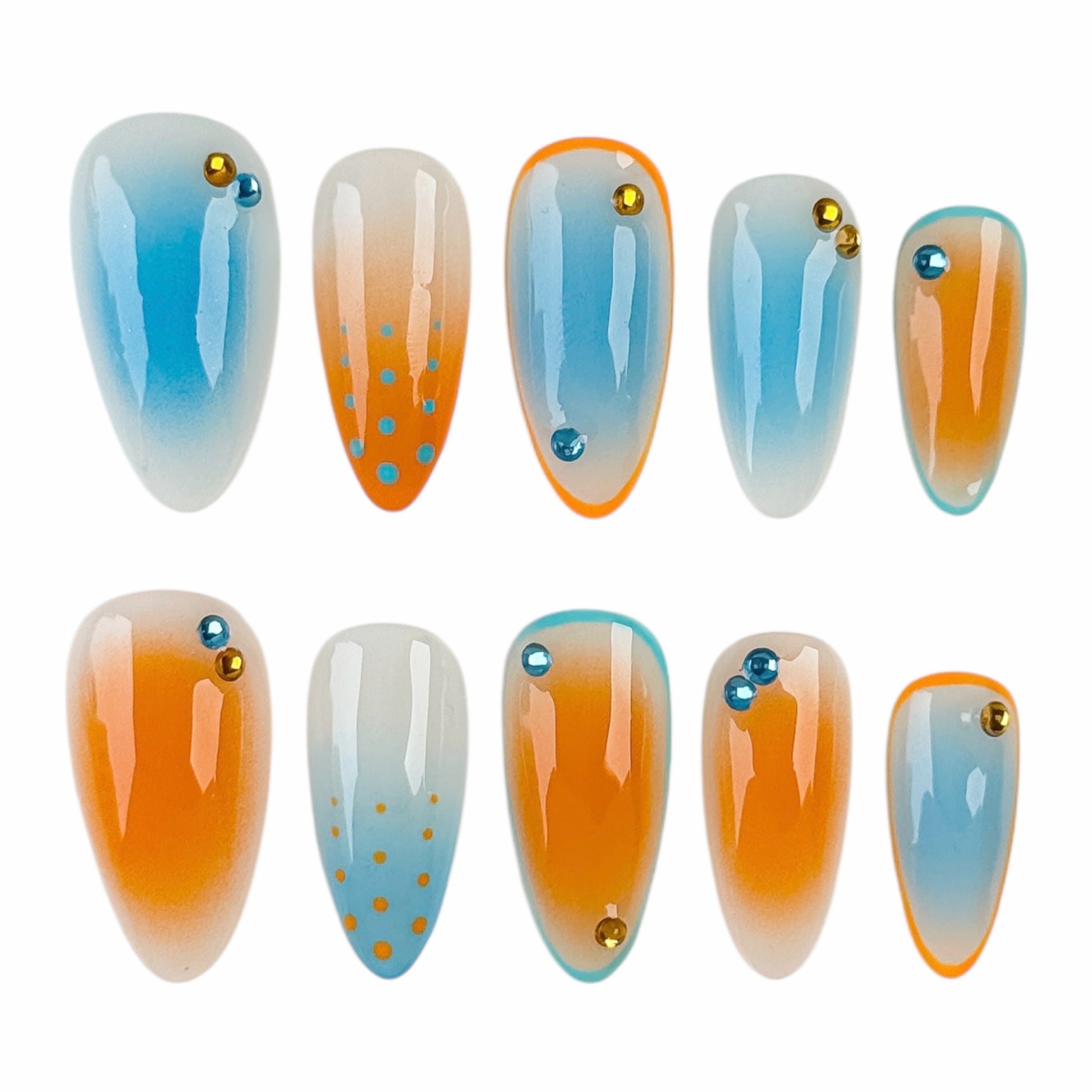 Faux ongles bleu et orange en dégradé avec finition brillante effet gel