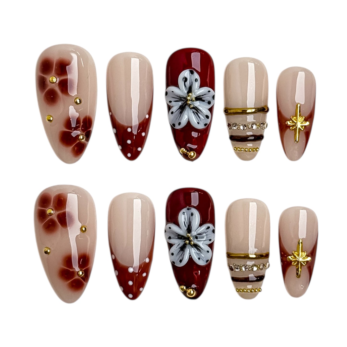 Ongles press-on nude et bordeaux avec fleur élégante